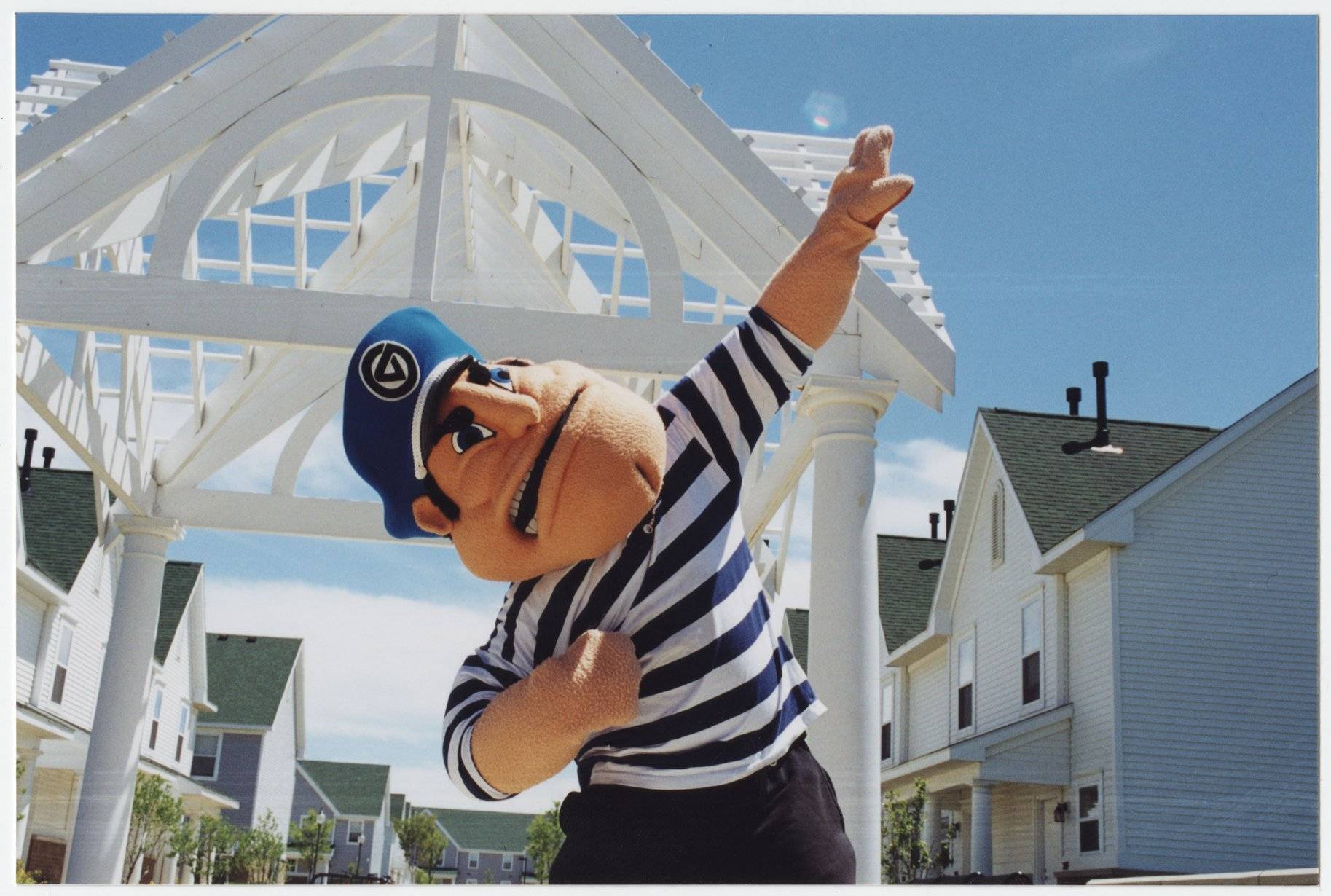 Louie in 1998 posing on campus